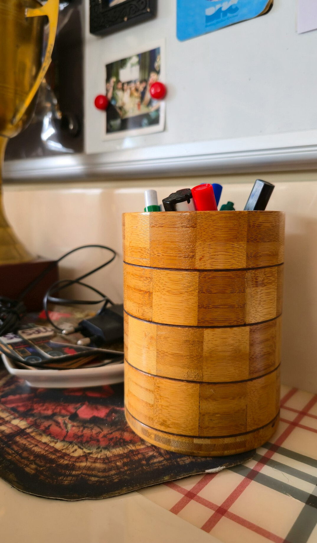 Writer's desk with an open notebook, fountain pen and a folded map